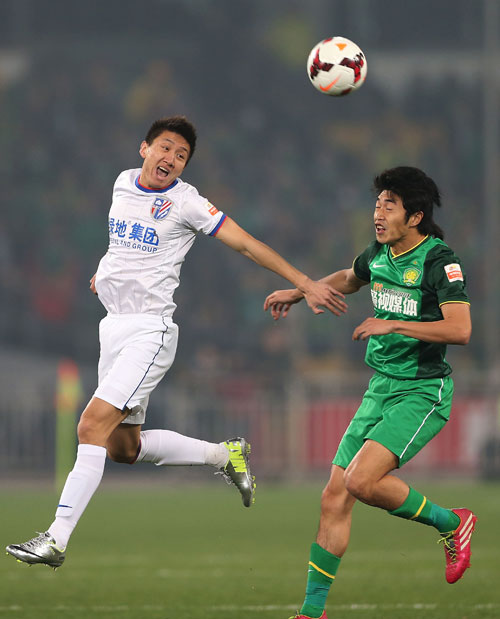 3��24�գ�������������Ա�Ժ;����ң��ڱ��������Ϻ��̵��껨����Ա�ߵ�ƴ�������գ���2014�й����򳬼����������ֱ����У�����������������2��0սʤ�Ϻ��̵��껨�ӡ��»�������������