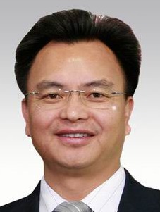 万庆良同志简历