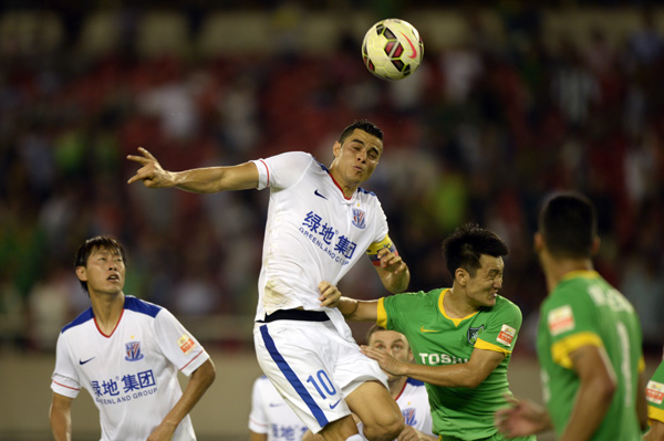8��11�գ��Ϻ��껨����ԱĪ��ŵ��������ڱ���������ͷ����Ӱ���»������ �ϻ���