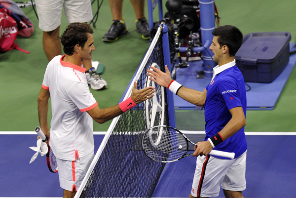 9��13�գ�����ά��ѡ�ֵ�Լ��ά�棨�ң�����ʿѡ�ַѵ����ڱ����������໥���⡣��Ӱ���»������ ����